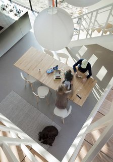 This Blackened Timber House Triumphantly Emerges After a Fire - Photo 6 of 6 - "We really enjoy the dining room: from here you can see out in all directions," Gerard says.