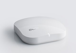 This Elegant Router Inspired by Eero Saarinen Will Declutter Your Desk - Photo 1 of 4 -