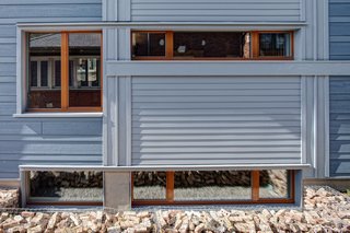 Sustainable Living: Chicago's First Certified Passive House - Photo 3 of 8 - The south windows provide much of the winter-free heat as well as the opportunity to break down the wall’s mass into a dynamic composition.<br><br>Photo by: Eric Hausman Photography
