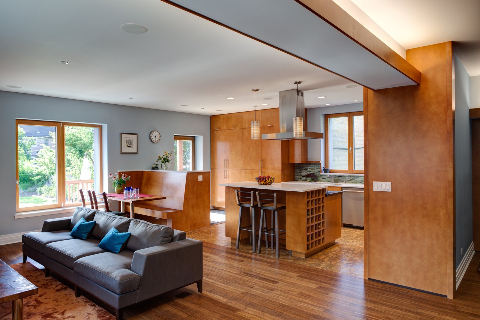Flooring includes Teragren bamboo, cork in the kitchen, and porcelain at entry points. American Yellow Birch was used for the cabinets and trimming.
Photo by: Eric Hausman Photography