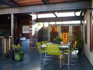 A frequent entertainer, Doug Burgum created the ultimate rooftop hangout for his Fargo, North Dakota, residence. With a few deft touches, architect Chris Hawley and landscape architect Brian Reinarts of Land Elements designed a space that can be used year-round and pays homage to the region.<br><br>Photo by: David Bowman