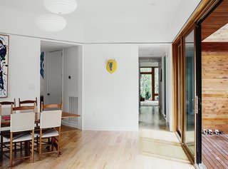 The Modern Home with Southern Charm - Photo 2 of 7 - The Eagle E-Series windows from the Andersen Architectural Collection are aluminum on the exterior and mixed fir grain on the interior. The white wall paint is Snowbound by Sherwin-Williams.