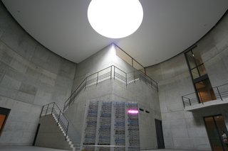 A Texas Couple Builds Their Cast-In-Place Concrete Dream Home - Photo 15 of 17 - Among the artwork on display is Bruce Nauman's 1984 100 Live and Die. Mounted on four metal monoliths, the neon's flickering glow is surrounded by Ando's concrete walls and skylight above. Photo Courtesy 準建築人手札網站 Forgemind ArchiMedia via flikr.