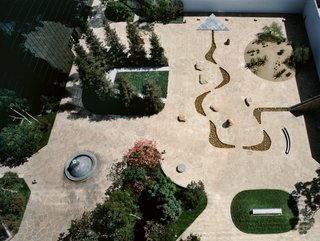 The California Scenario, Costa Mesa, California<br><br>Noguchi's abstract composition completed in 1982 features elements representing the Golden State's diverse ecosystems: mountains, redwoods, rivers, deserts, and meadows. The 1.6-acre sculpture garden open to the public and visiting information is located <br><br>here.