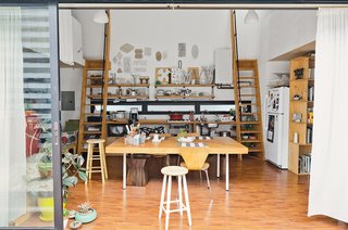 Like the other larger upstairs units, Puzio’s includes two loft spaces flanking the kitchen, whereas those below have one.
