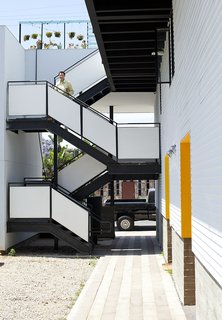 "The simple volume of the space and large openings let light and air flow freely," Benson says. "The environment is always pleasant even without air conditioning or heating."