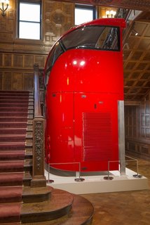 A section of Heatherwick's new bus design, barely clearing in size for an installation within the main staircase of the Cooper Hewitt, emphasizes its impressive scale.
