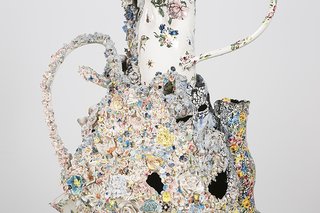 The sculptures reference everyday decorative objects, such as vases or mug handles, but turn them into something eeriely unfamiliar, as seen in this detail of the flower-encrusted Bloemenhouder.