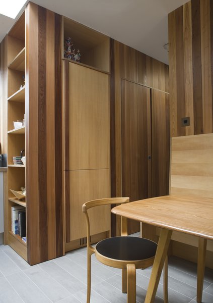 “We wanted a house that was warm and intimate, and this meant carefully considering materials and finishes,” says Thomson. “We have chosen a limited pallet of quality, robust, and tactile materials that provide a consistent theme throughout the house.” Western red cedar was used for internal cladding, built-ins, and seating. Photo 4 of Islington Residence modern home