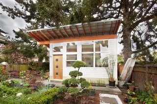 7 Multipurpose Sheds and Studios That Upgrade the Backyard - Photo 6 of 7 - Working with a limited budget, First Lamp designed and built one principle architectural flourish: exposed Douglas fir rafters that would weather to a brighter red over the years and accent the white siding.