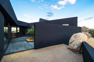 "There was the challenge of how to build appropriately on such a sublime and pristine site," explains Pejic. "It is akin to building a house in a natural cathedral."