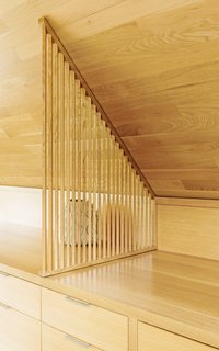 "Our desire was to have the spaces appear as though they were carved from a single block of wood, with the movable pieces an integral part of the overall composition," says Vincent. "This created a feeling of seamlessness."
