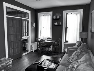 How One Family of Three Does It All in 675 Square Feet - Photo 9 of 14 - The renovation stripped away crown molding and French doors.