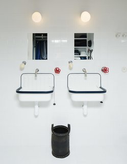 Boffi faucets join sinks from Labour and Wait in the bathroom.