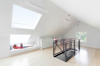 An added benefit of installing the skylights was adding headroom over the day beds, Smith says.