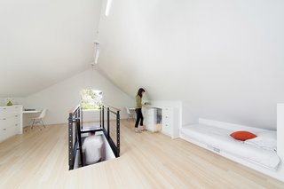 The bamboo flooring is by Plyboo. The Moonrise Plus pendant lamps are by Eureka.