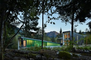"I wanted the buildings to be crisp, bold, and clean," Coleman said. Exterior vertical siding is made from locally sourced cedar stained in a "hazelnut" shade by Sikkens Cetol SRD.