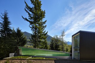 A polycarbonate wall by Lexan Thermoclick colors the west side of the studio. Exterior doors are from Codel, and they are also painted in Benjamin Moore’s "dark pewter."