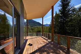 "I wanted to create ‘defensible’ outdoor rooms that flowed in and around the buildings," Coleman said. The deck was built with Red Balau hardwood, which has a custom oil finish by Messmer’s.