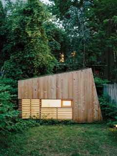 An Architect Builds His Own Backyard Oasis From Salvaged Materials - Photo 1 of 5 - Architect Nicholas Hunt used his garden as a laboratory for his budding private practice, creating a 55-square-foot studio filled with handcrafted details, including a half-inch reveal surrounding the front window and a Plexiglas skylight. "When a place is this small, the minimal details need to be nice," Hunt says.