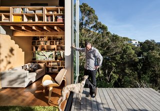 Oriented to absorb the afternoon sun, floor-to-ceiling doors comprise two-thirds of the home’s west-facing walls, which open to an elevated deck overlooking Island Bay. Combined with extra-thick building insulation, this passive element provides sufficient heating for the home, even during winter months—a true feat given the region’s cold seasonal winds.
