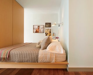 This Luxurious Apartment in Greenwich Village Is Only 520 Square Feet - Photo 2 of 6 - Dufner also designed the bed, which features storage panels under the mattress.
