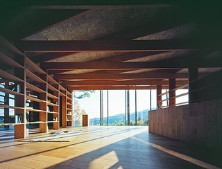 Japanese Home Among the Trees Uses Bookshelves and Glass for Walls - Photo 3 of 8 - The wood flooring throughout the home is by Kodama.