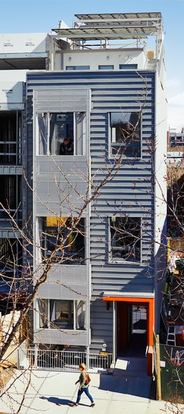 As far as Castrucci is concerned, he’s a modern architect with a modern view of the world, and that includes sustainability and aesthetics. “Good architecture will always relate to the sun and light; that’s important,” he says. In addition, with a solar array on the roof providing about a 4.2 kilowatt system per apartment, it’s like each resident has their own utility company. Photo 3 of R-951 modern home