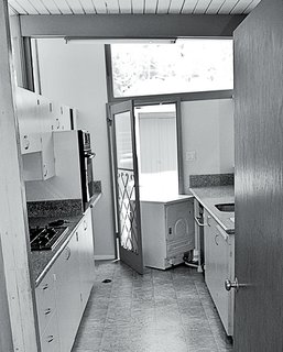 Prior to the renovation, the kitchen had a cramped midcentury style.