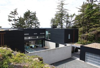The main building sinks then elevates in full view of ocean.