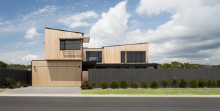 A Modular Beach Home in Australia Allows One Family to Keep an Eye on the Surf - Photo 4 of 8 - The four separate modules, made primarily from timber, took 26 weeks to construct. To offset the amount of wood used in construction, Archiblox plants 100 trees for each home it builds.