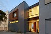 Modern home with Outdoor and Raised Planters. Studio VARA explains “the project’s success lies in the judicious use of carefully executed moments," such as wood screen that recreates the privacy of now-trimmed tree branches. Studio VARA also cites a "subtle palette of ‘warm’ mixed with ‘cool’ that recurs in both tone and materials: wood juxtaposed with glass, metal against stone.” Photo of Noe Residence