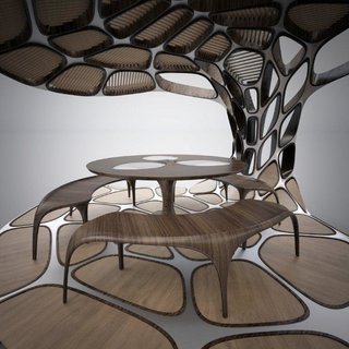 Why Your Next Prefab May Be by a World-Famous Designer - Photo 1 of 8 - Volu Dining Pavilion by Zaha Hadid and Patrik Schumacher One of the first unveiled designs features curvy wood dining furniture nestled inside a metal structure in the shape of an oversized open clamshell. Backlit by purple-toned LEDs, Volu embodies the sci-fi effect typical of Hadid’s work. Each Volu Dining Pavilion, to be be produced in an edition of 24, will go for $480,000.