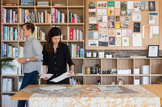 12 “Pro-Tips” For Installing Wallpaper in Your Home - Photo 2 of 13 - "We draw inspiration from artists like James Turrell or Donald Judd, who understand color and form in an advanced way. Or even Raf Simons. We're definitely pulling inspiration from various mediums," Calico co-founder Nick Cope says. Nick and Rachel review materials in their Brooklyn-based studio.