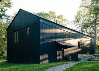 "Who better than the farmer and the farmer's family to know how most effectively and easily to find efficiency?" says architect Alan Barlis. Regional architecture inspired the barn-life structure of the house, an open volume that aides in efficient heating and cooling of the space.