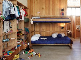 One-of-a-Kind Furniture Fills This Delightfully Serene Buenos Aires Home - Photo 5 of 10 - The children’s bedroom features NET bunk beds and storage baskets from Mono, the design shop of Sticotti’s wife, Mercedes Hernáez.