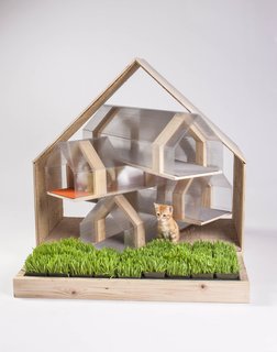 The pentagonal profile that is a recurring motif in HOK's cat shelter references traditional housing shapes. The idea was to create a design that could be replicated and built with a kit-of-parts-style of assembly.
