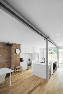 Blocked in on Two Sides, a Renovation Opens a Quebec Apartment to Tons of Natural Light - Photo 3 of 8 -