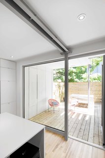 Blocked in on Two Sides, a Renovation Opens a Quebec Apartment to Tons of Natural Light - Photo 4 of 8 -