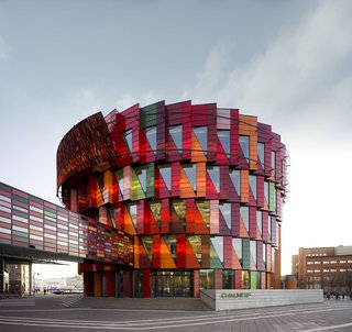 Go Inside the Whimsical and Geometric Mind of Gert Wingårdh - Photo 1 of 9 - Kuggen, University Hub at the Chalmers Campus Lindholmen Located in Gothenburg, Swede, Kuggen is a university building to connect various departments together. Designed look different at all angles, the triangular windows alternate between glass and glazed terracotta panels. The build mixes leasable offices and classrooms to cultivate an active town. Aside from its striking appearance, the building is equipped with motion-activated lighting and ventilation systems to save energy. 
