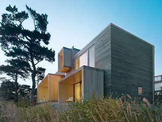 Go Inside the Whimsical and Geometric Mind of Gert Wingårdh - Photo 9 of 9 - Fjallbacka House Wingårdh designed this vacation home for two midcentury furniture dealers on the western coast of Sweden. The three-bedroom house is comprised of several pine-clad boxes connected together. The house features a roof deck to enjoy the views of the sea. 