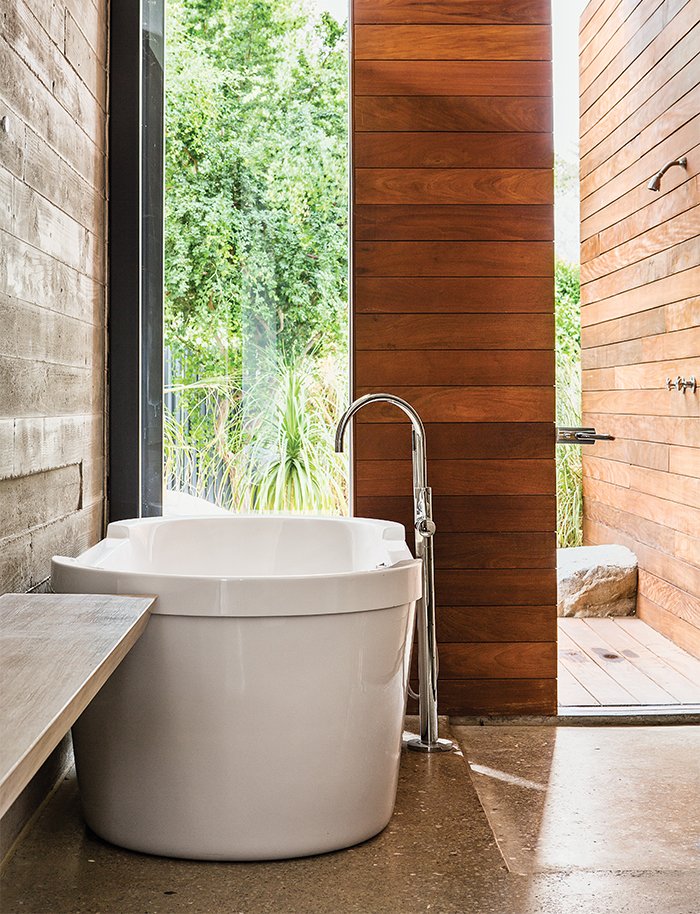 40 Modern Bathtubs That Soak In the View In the master bath, a Dornbracht tub filler is paired with a tub by Philippe Starck for Duravit.