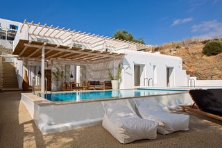 The villa is where you'll find a true celebration of island living. Designed to transition from an oasis of privacy to an entertaining hub, it's built to fit up to 22 people. 