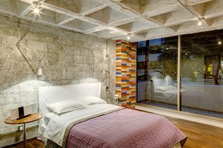 This Retro Apartment Is Finally the Good Kind of Funky - Photo 6 of 7 - Each of the private zones enjoys its own outdoor space. The master bedroom has access to a balcony that runs along the front of the apartment. 
