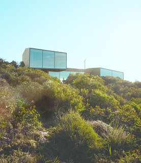 This Surfer Rules the Ocean from a Cliffside House - Photo 1 of 9 - This home in the village of Fairhaven gazes over the area's longest beach and an open sea that stretches all the way to Antarctica.