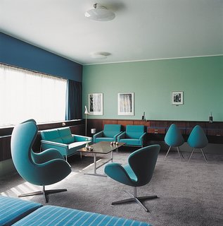 Room 606 in the hotel is preserved exactly as Jacobsen designed it. "I love the idea of preserving history," Hayon says. But hotels are made to be used and furniture faces a major test in these spaces. It's interesting to see history by looking at the color choice and choice of elements in the space."