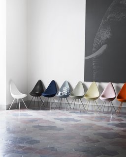 After being out of commission for more than 50 years, the Drop chair is now fully back in production and available in a wide range of color and upholstery options—a number of the various choices are shown here. 
