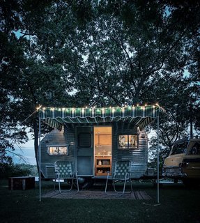 5 Tiny Homes on Wheels - Photo 5 of 5 - An exterior shot of a trailer at the camp.