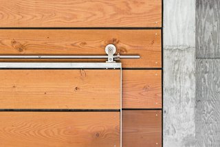 Yes, It Is Easy Being Green - Photo 2 of 4 - Architect Michael Cobb used Douglas fir harvested from the site throughout the house, such as on a sliding door outfitted with Swiss Rod SS hardware from the Real Carriage Door Company.</p><p><br>
