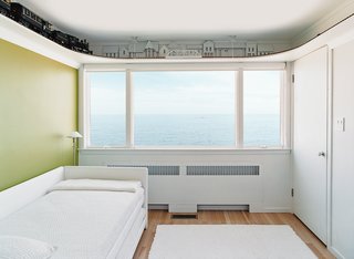 Bauhaus by the Sea - Photo 6 of 8 - Upstairs, the bedrooms are arranged in a uniform line of five cubicles. Initially, each bedroom had a vividly colored western wall—red, blue, yellow, or green—with the remaining three walls painted white.